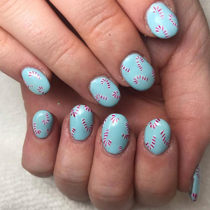 Press-On Nail Art with Candy Cane Design