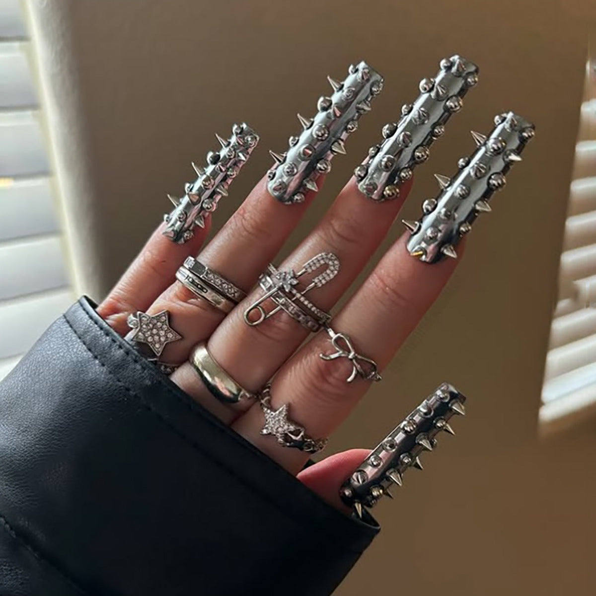 Spiked Press-On Nails with Artistic Design