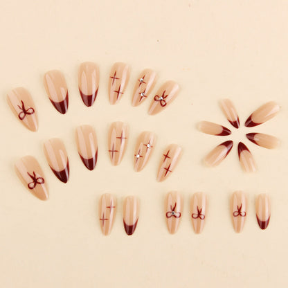 Decorative Nail Art Set with Press-On Design, Bow, and Crystal Details