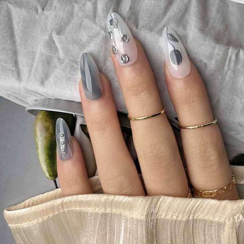 Contemporary Press-On Nail Design with Artistic Stiletto Shape