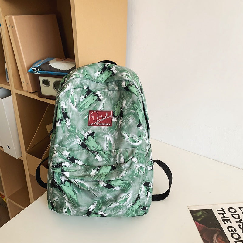 Versatile School Backpack with Abstract Pattern Design