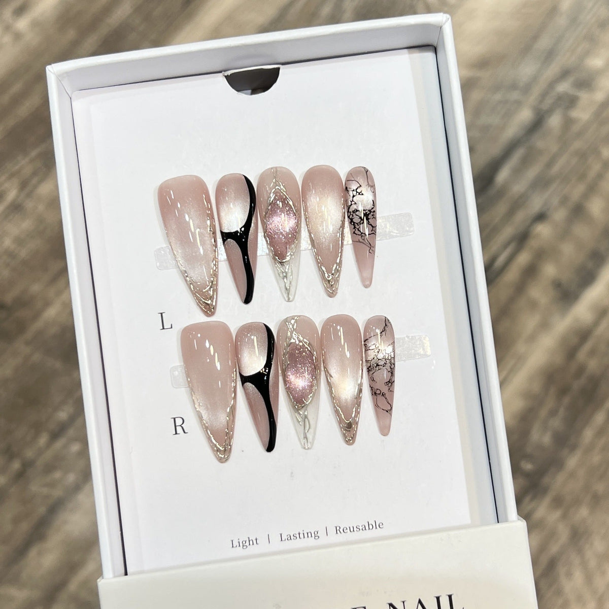 Stiletto Press-On Nails with Distinctive Marble Pattern