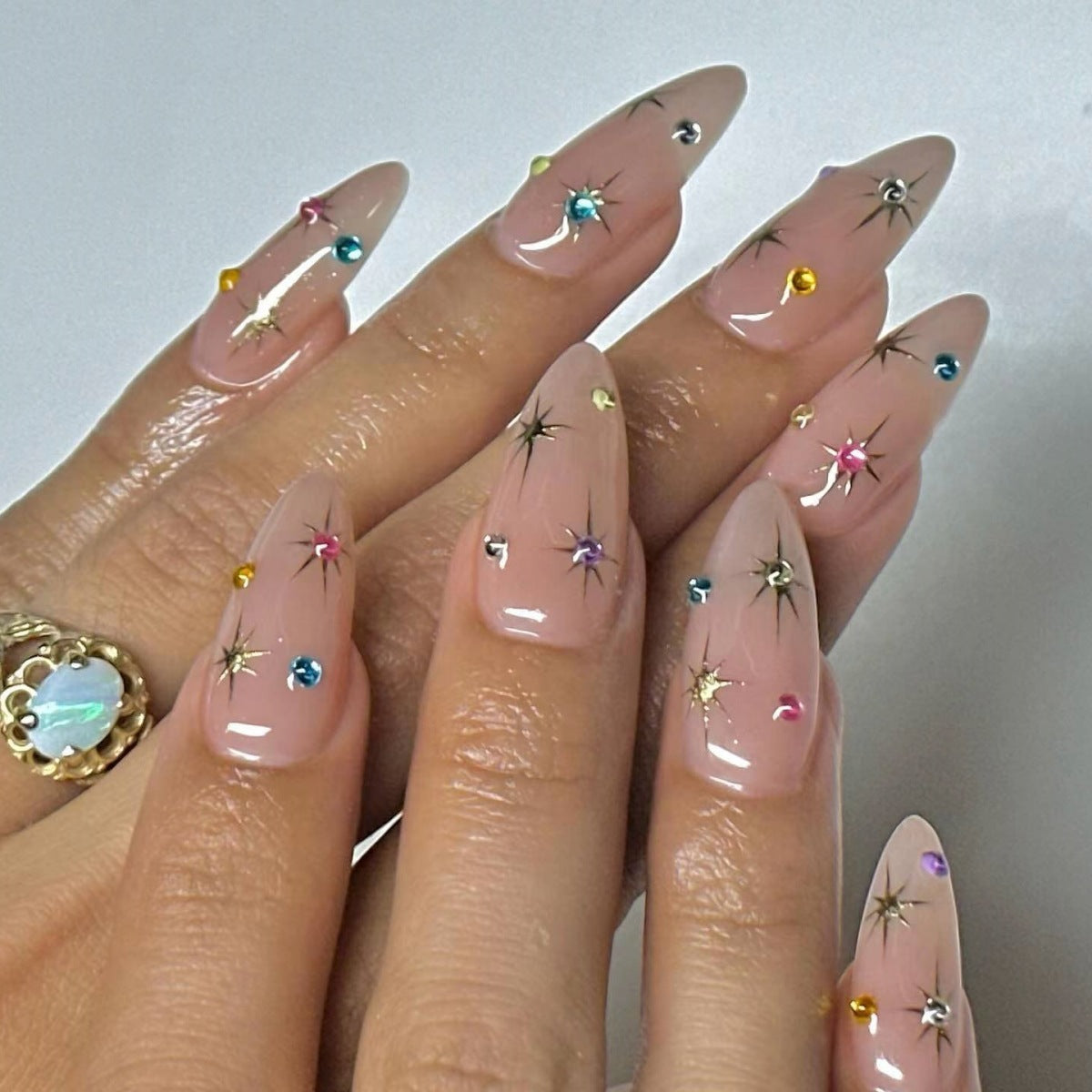 Almond-Shaped Nail Extensions with Rhinestone Accents