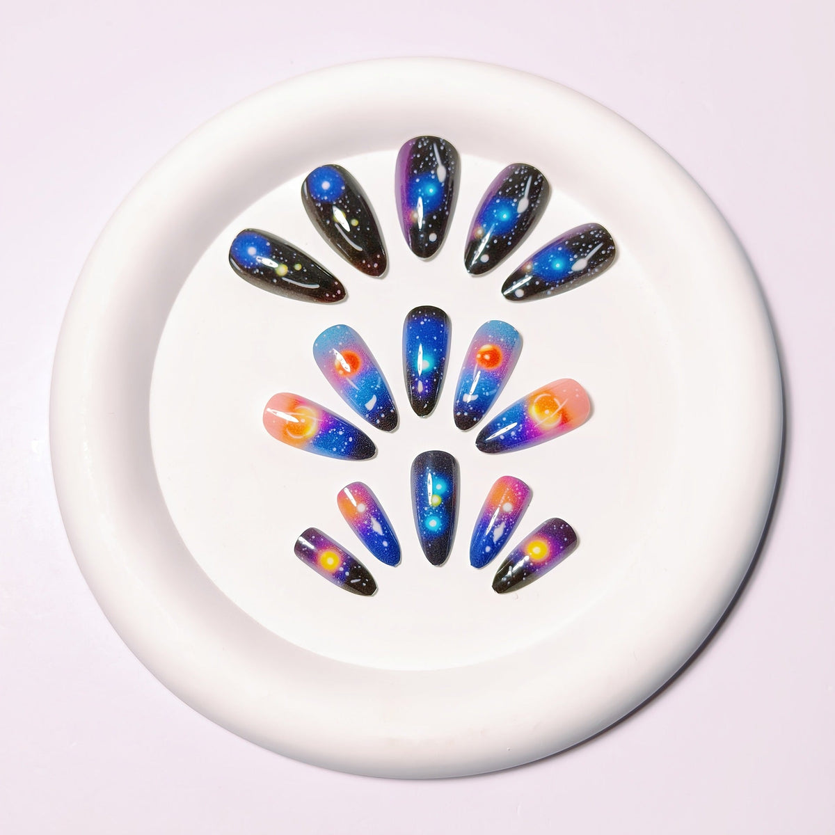Galaxy-Inspired Nail Art Set with Celestial Designs