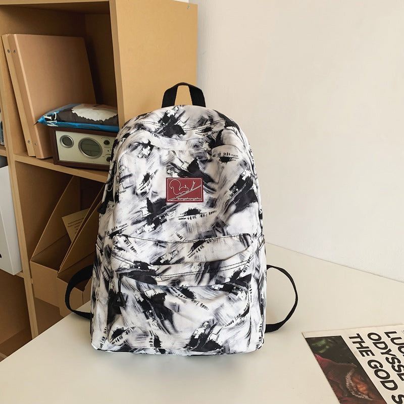 Versatile School Backpack with Abstract Pattern Design