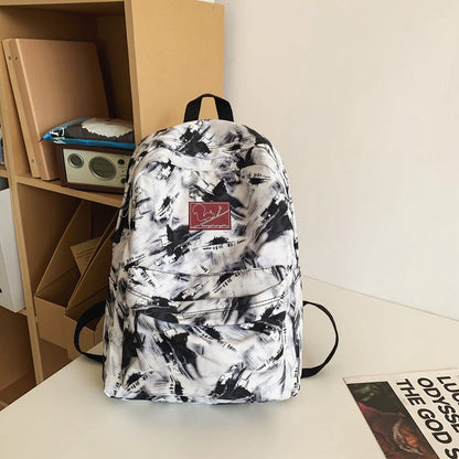 Versatile School Backpack with Abstract Pattern Design