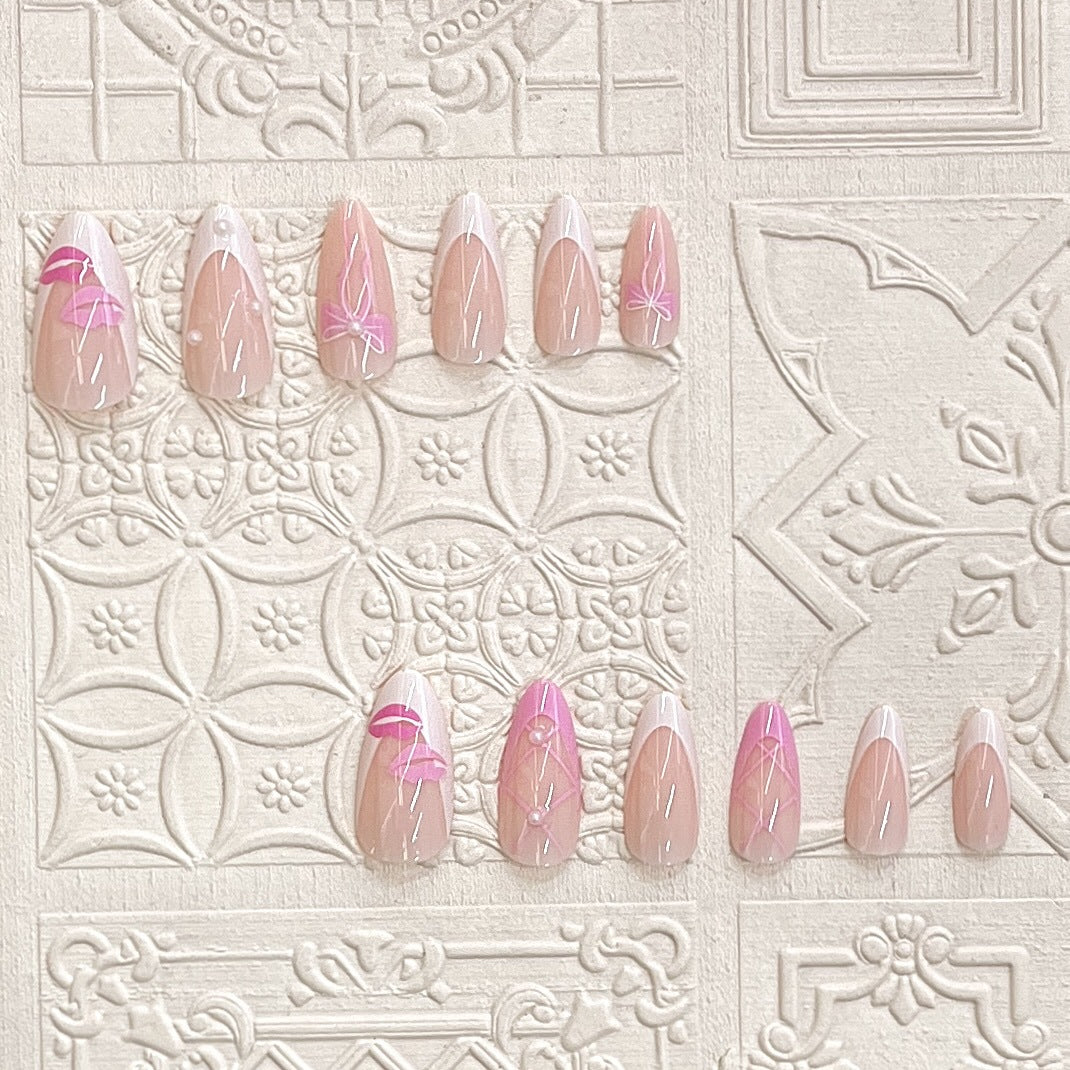 Press-On Nail Kit Featuring Bow and Kiss Patterns