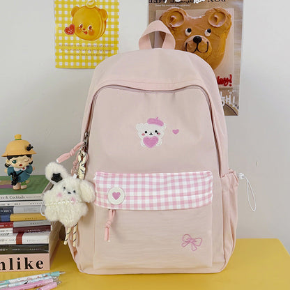 Charming School Backpack with Fun Character Design