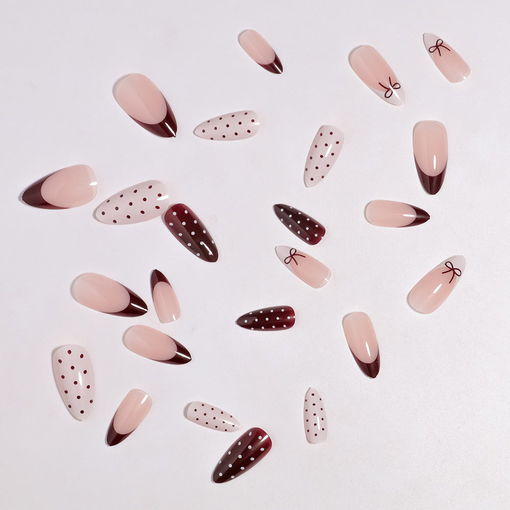 Press-On Nail Art Set Featuring Bow and Dot Patterns