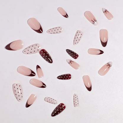 Press-On Nail Art Set Featuring Bow and Dot Patterns