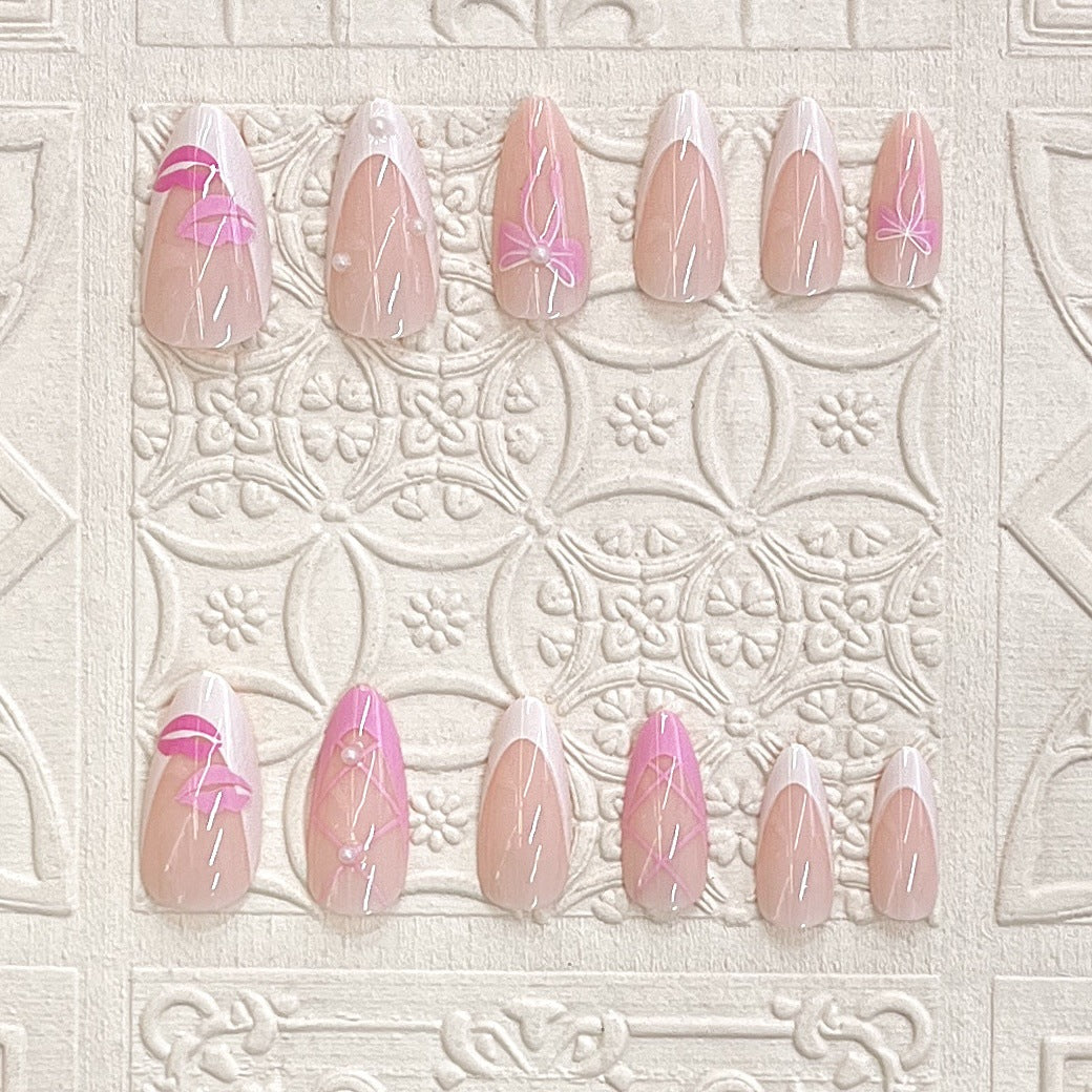 Press-On Nail Kit Featuring Bow and Kiss Patterns