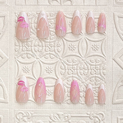 Press-On Nail Kit Featuring Bow and Kiss Patterns