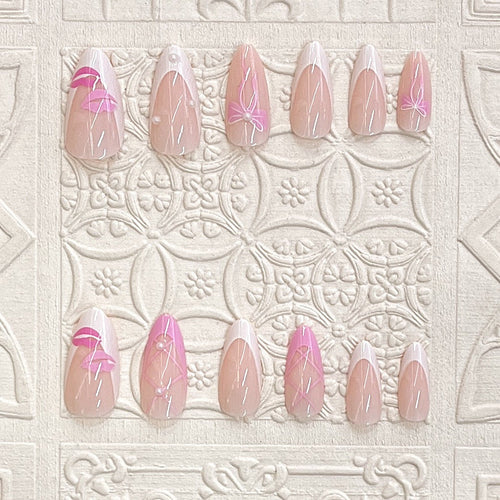 Press-On Nail Kit Featuring Bow and Kiss Patterns