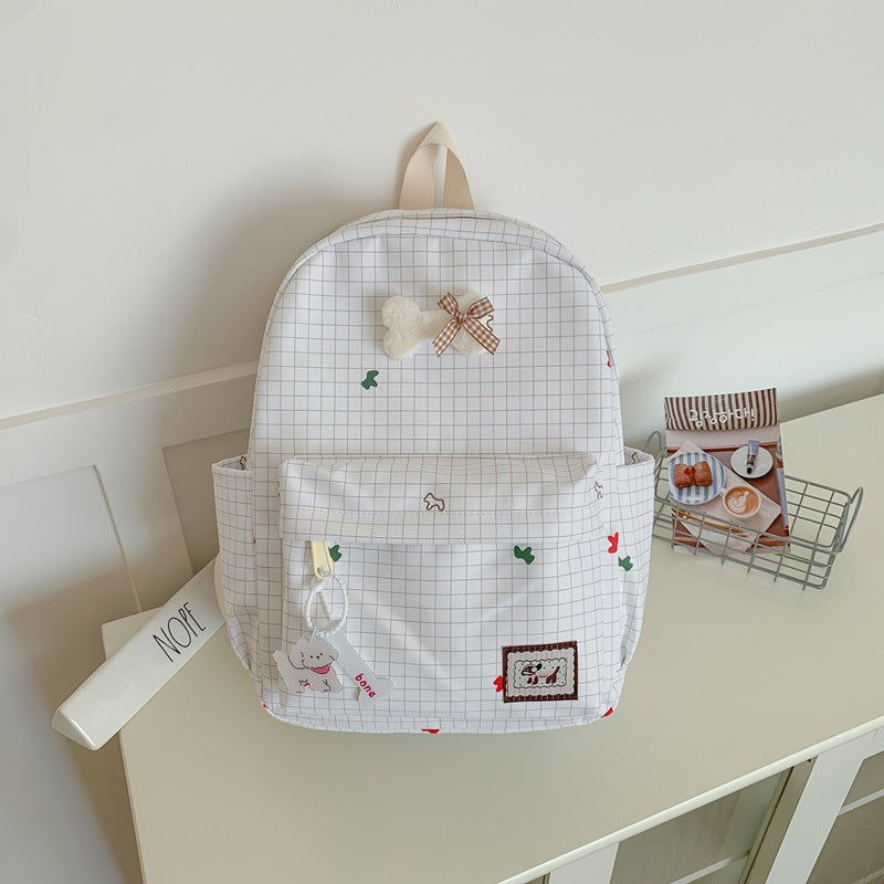 Charming School Backpack with Character-Themed Grid Design