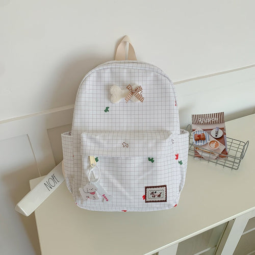 Charming School Backpack with Character-Themed Grid Design