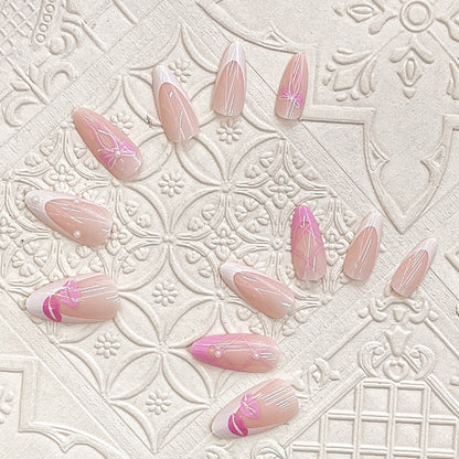 Press-On Nail Kit Featuring Bow and Kiss Patterns