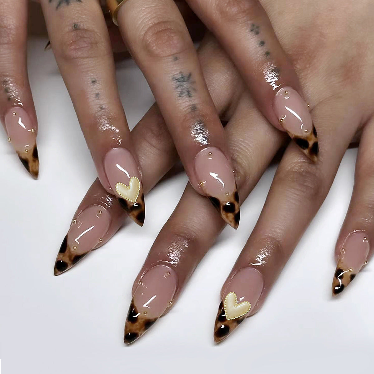 Artistic Stiletto Nails with Trendy Animal Print Design