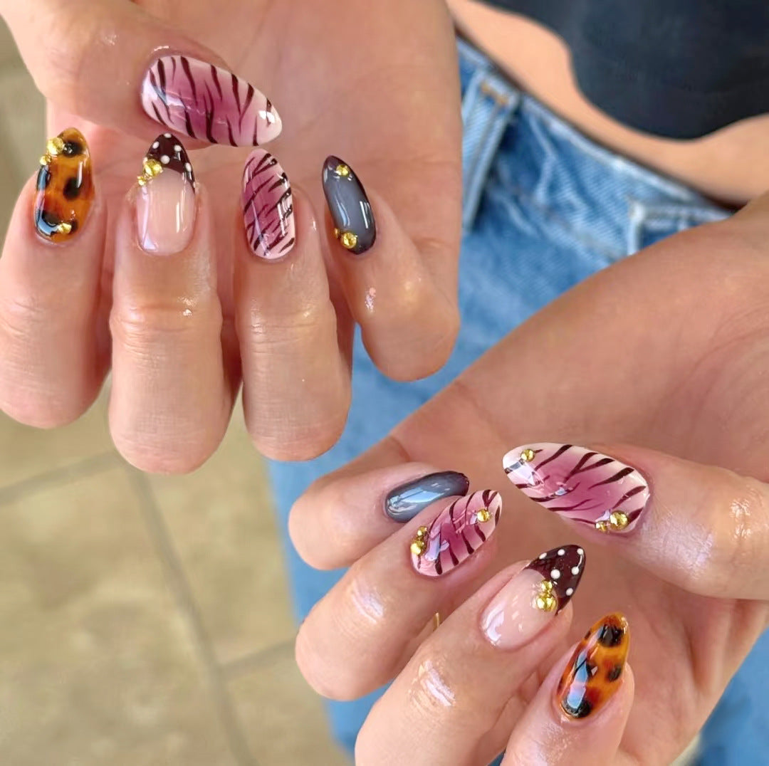 Unique Patterned Press-On Nail Set with Decorative Elements