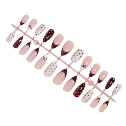 Press-On Nail Art Set Featuring Bow and Dot Patterns