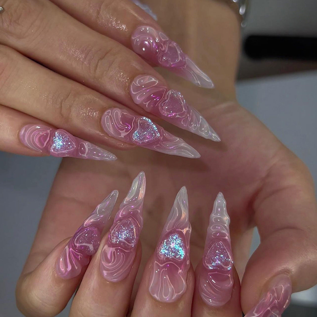 Heart Design Stiletto Nails with Glitter Accents