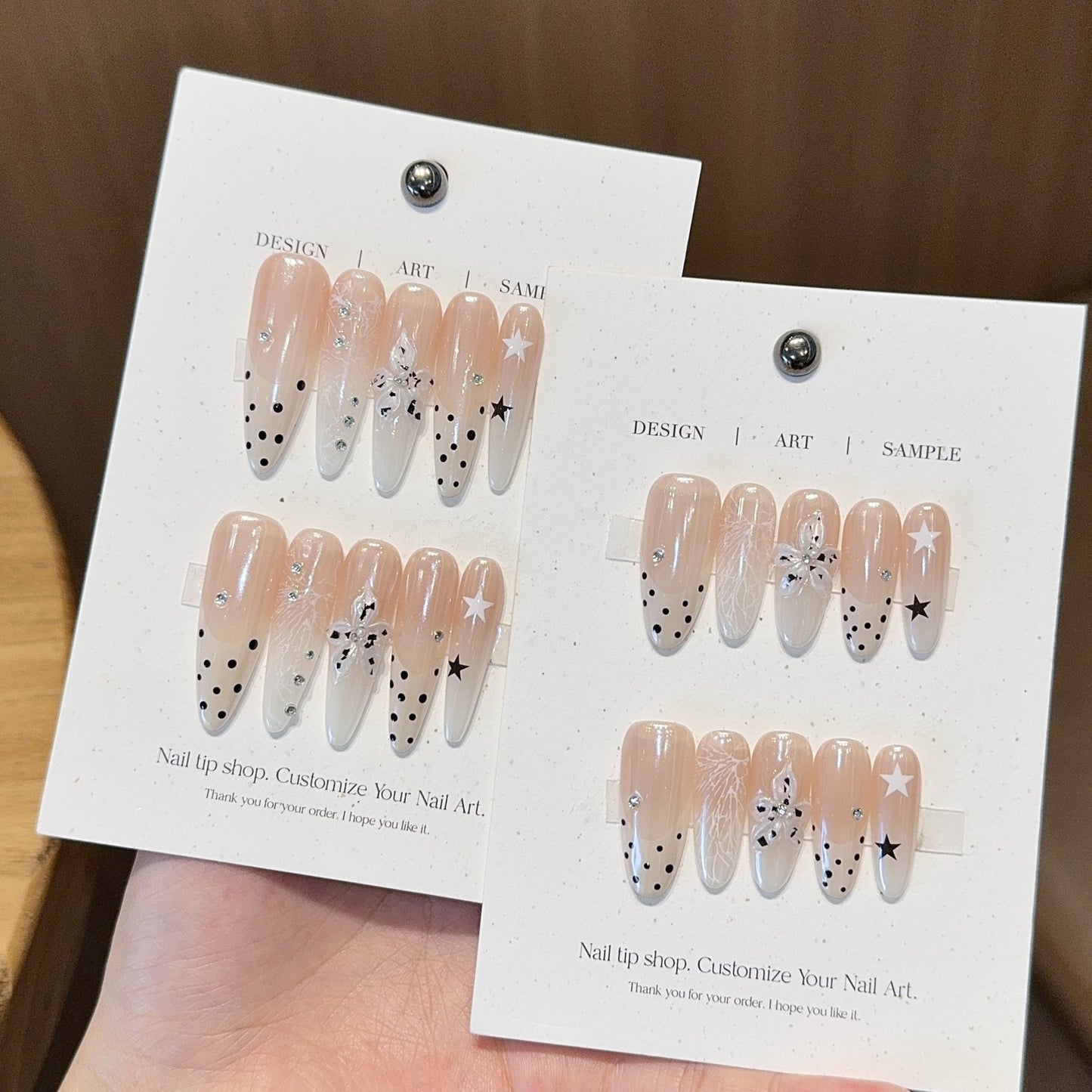Creative Acrylic Nail Kit with Shimmering Accents and Unique Designs