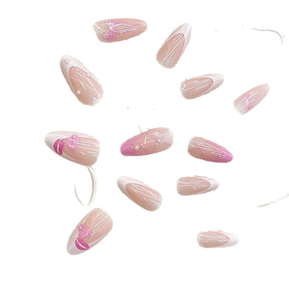 Press-On Nail Kit Featuring Bow and Kiss Patterns