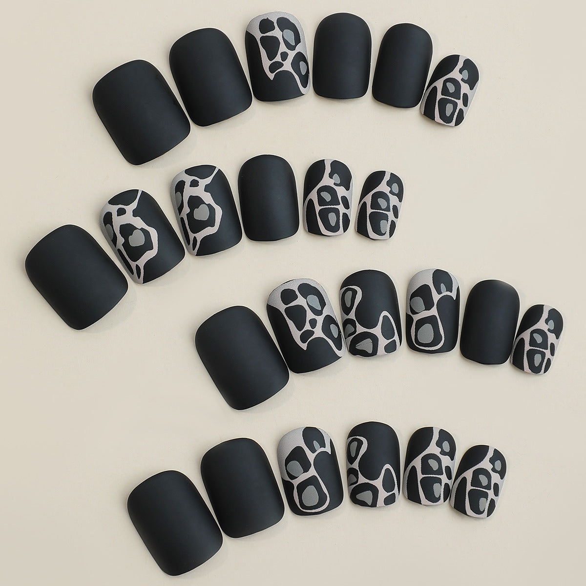 Elegant Design Press-On Nail Set with Artistic Elements