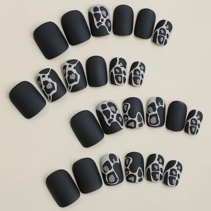 Elegant Design Press-On Nail Set with Artistic Elements