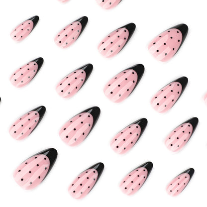 Black Dot Patterned Stiletto Nails – Artistic Design