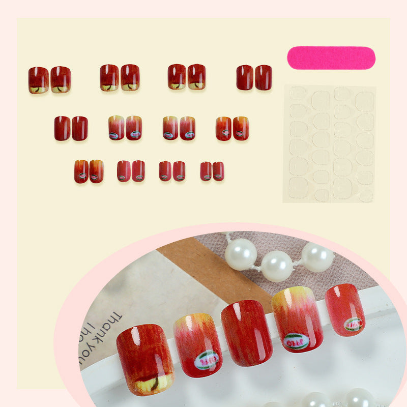 Press-On Nail Kit Featuring Creative Apple Patterns