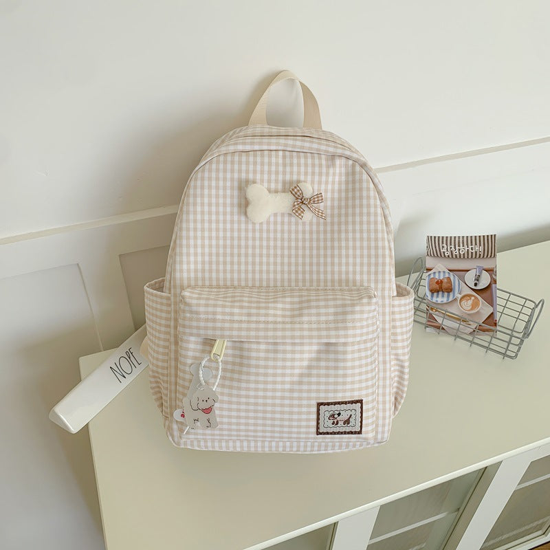Charming School Backpack with Character-Themed Grid Design