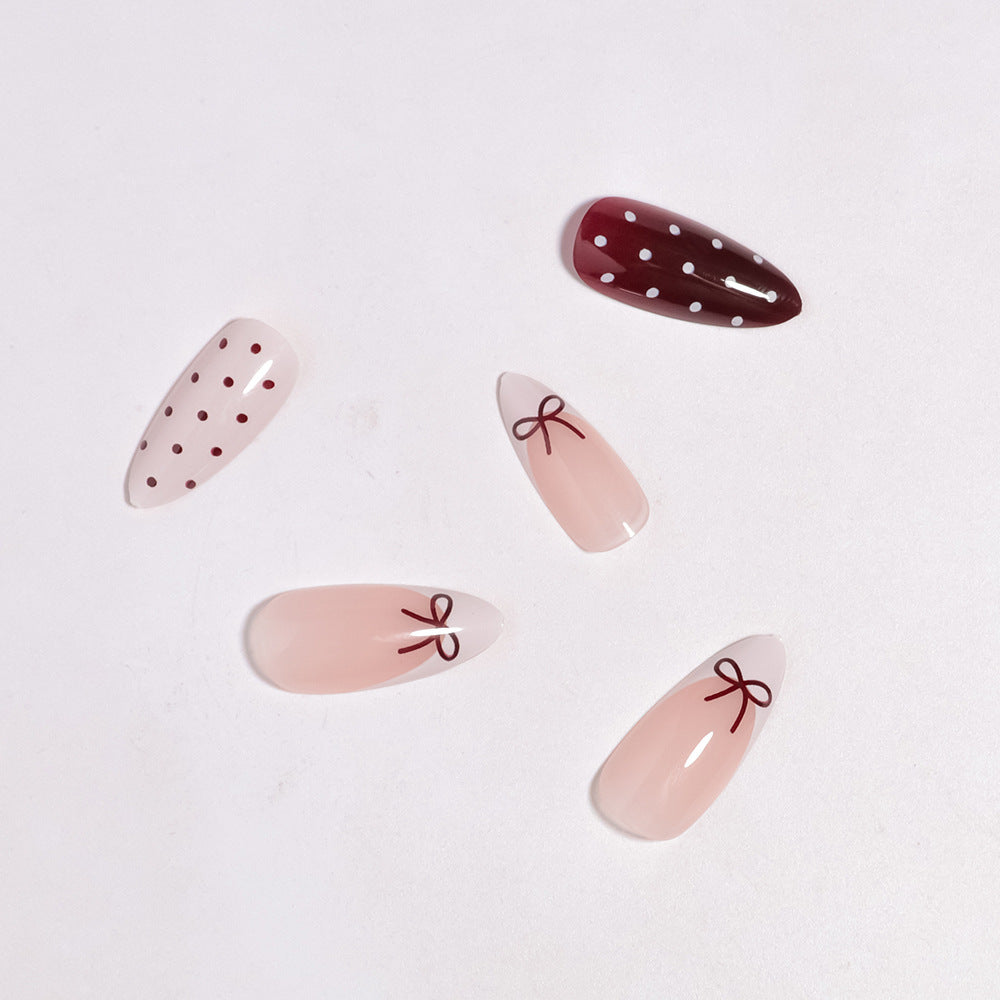Press-On Nail Art Set Featuring Bow and Dot Patterns