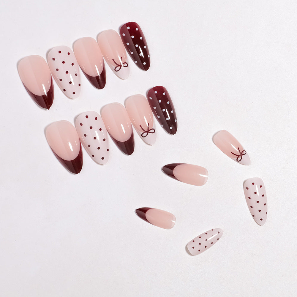 Press-On Nail Art Set Featuring Bow and Dot Patterns