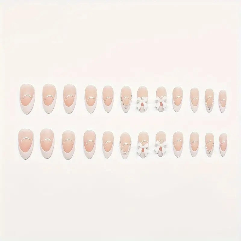Press-On Nail Art Featuring Bow Details