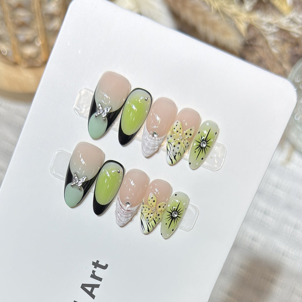 Press-On Nail Kit Featuring Butterfly and Floral Patterns