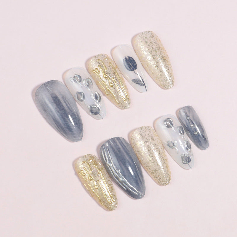 Contemporary Press-On Nail Design with Artistic Stiletto Shape