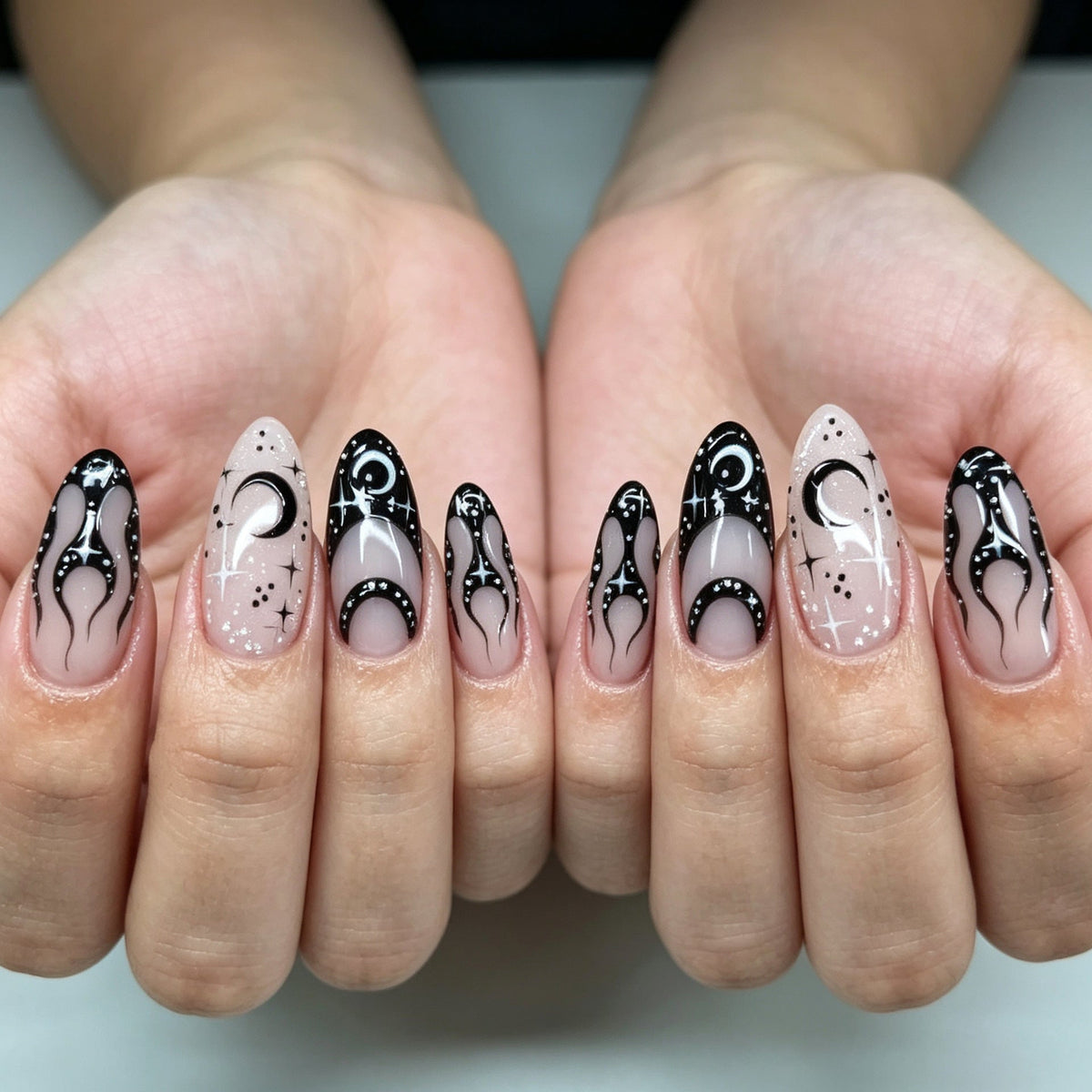 Elegant Stiletto Nail Extensions in Artistic Design