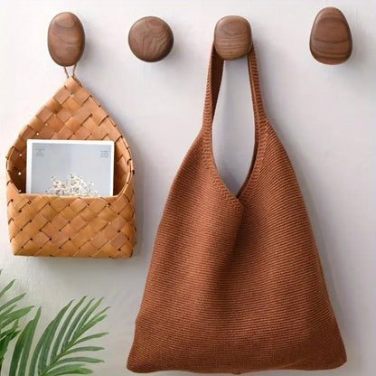 Sleek Stone-Inspired Wooden Wall Hook