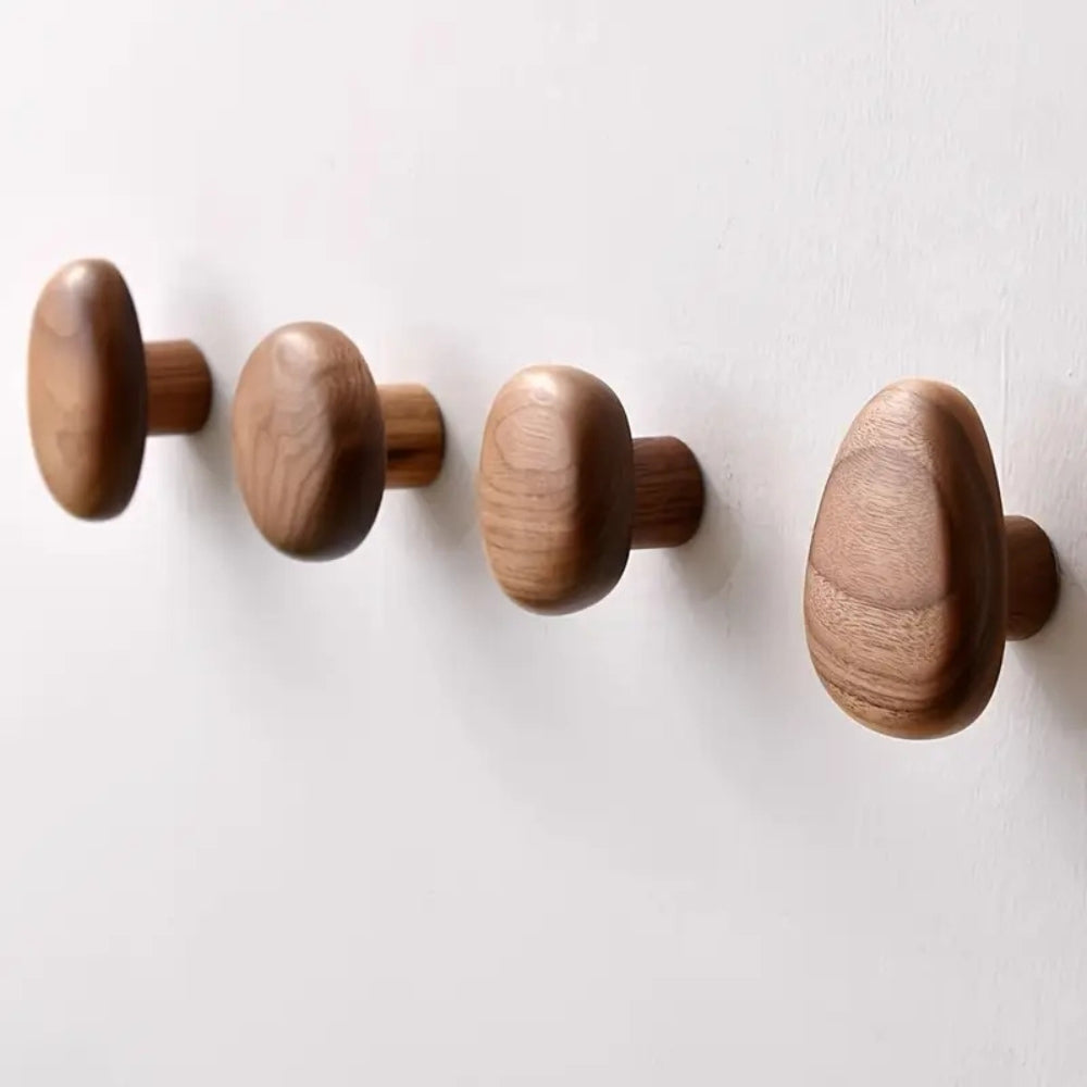 Sleek Stone-Inspired Wooden Wall Hook