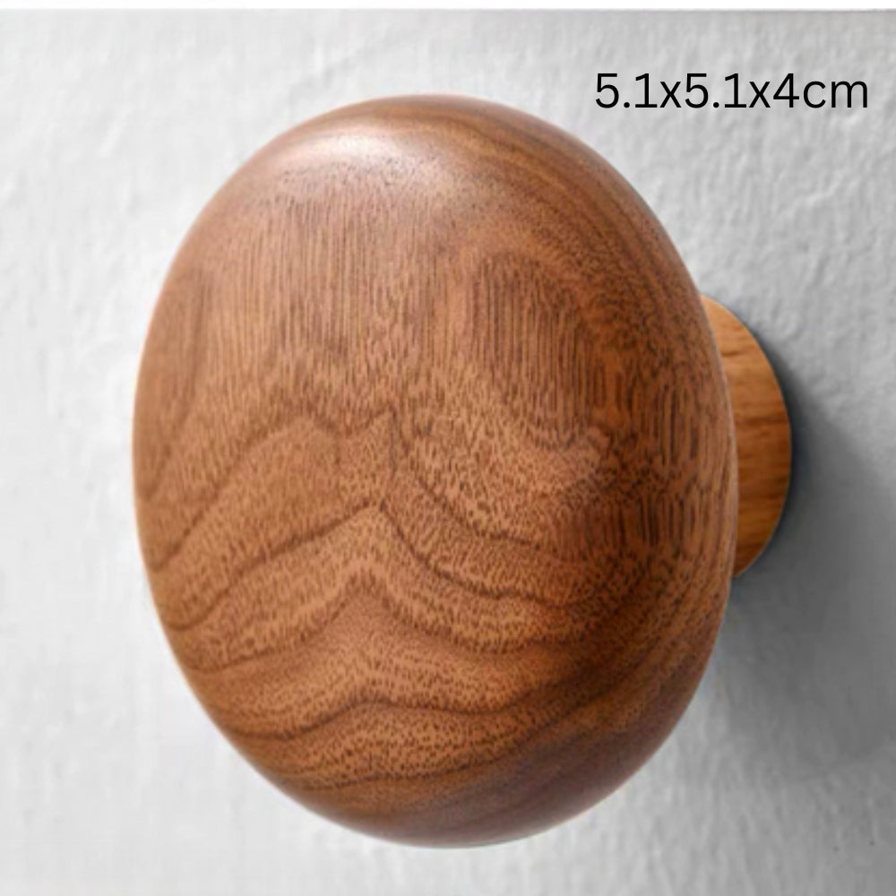 Sleek Stone-Inspired Wooden Wall Hook