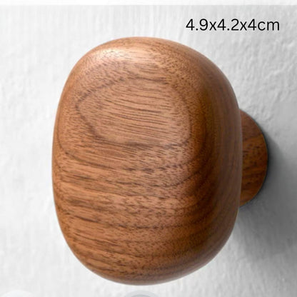 Sleek Stone-Inspired Wooden Wall Hook