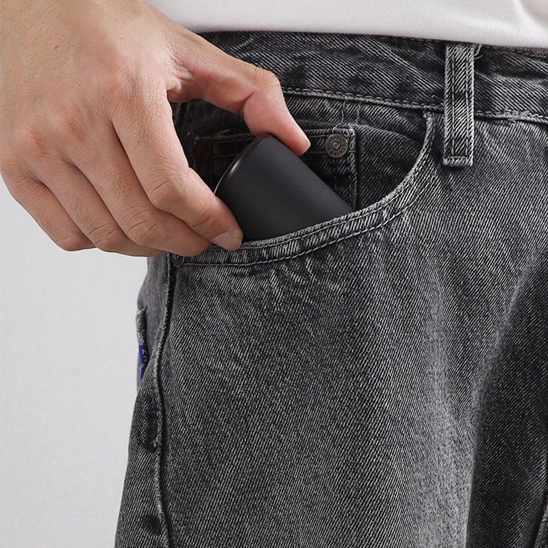 TravelTrim Electric Shaver - Compact & Washable Grooming Tool
