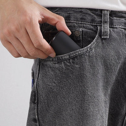 TravelTrim Electric Shaver - Compact & Washable Grooming Tool