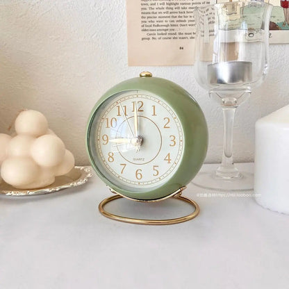 Vintage Alarm Clock with Gold Accents in Retro Style