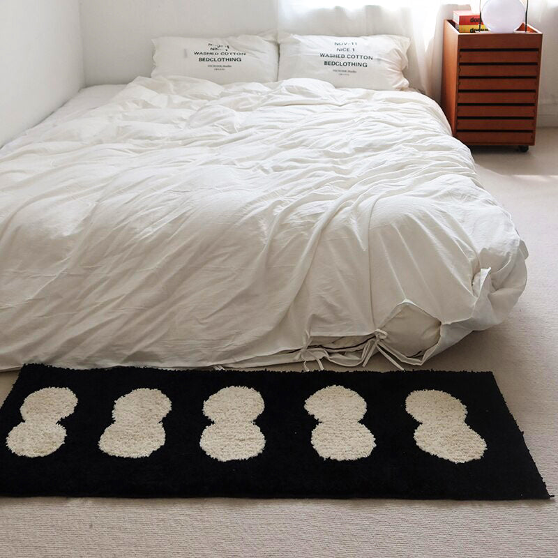Narrow Abstract Rug in Black and White Design