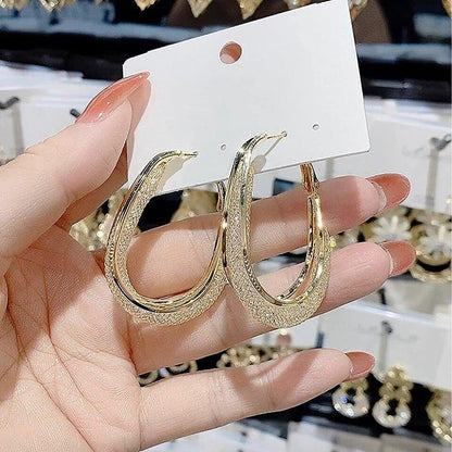 Radiant Twist Hoop Earrings for a Dazzling Look