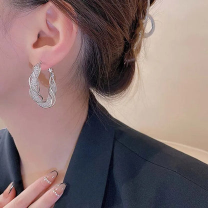 Gleaming Essence Earrings: Elevate Your Elegance