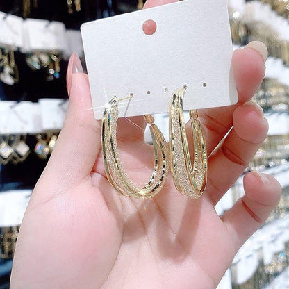 Radiant Twist Hoop Earrings for a Dazzling Look