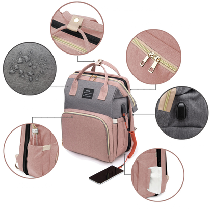 Travel Crib and Stroller Included in Convertible Diaper Bag