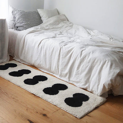 Narrow Abstract Rug in Black and White Design